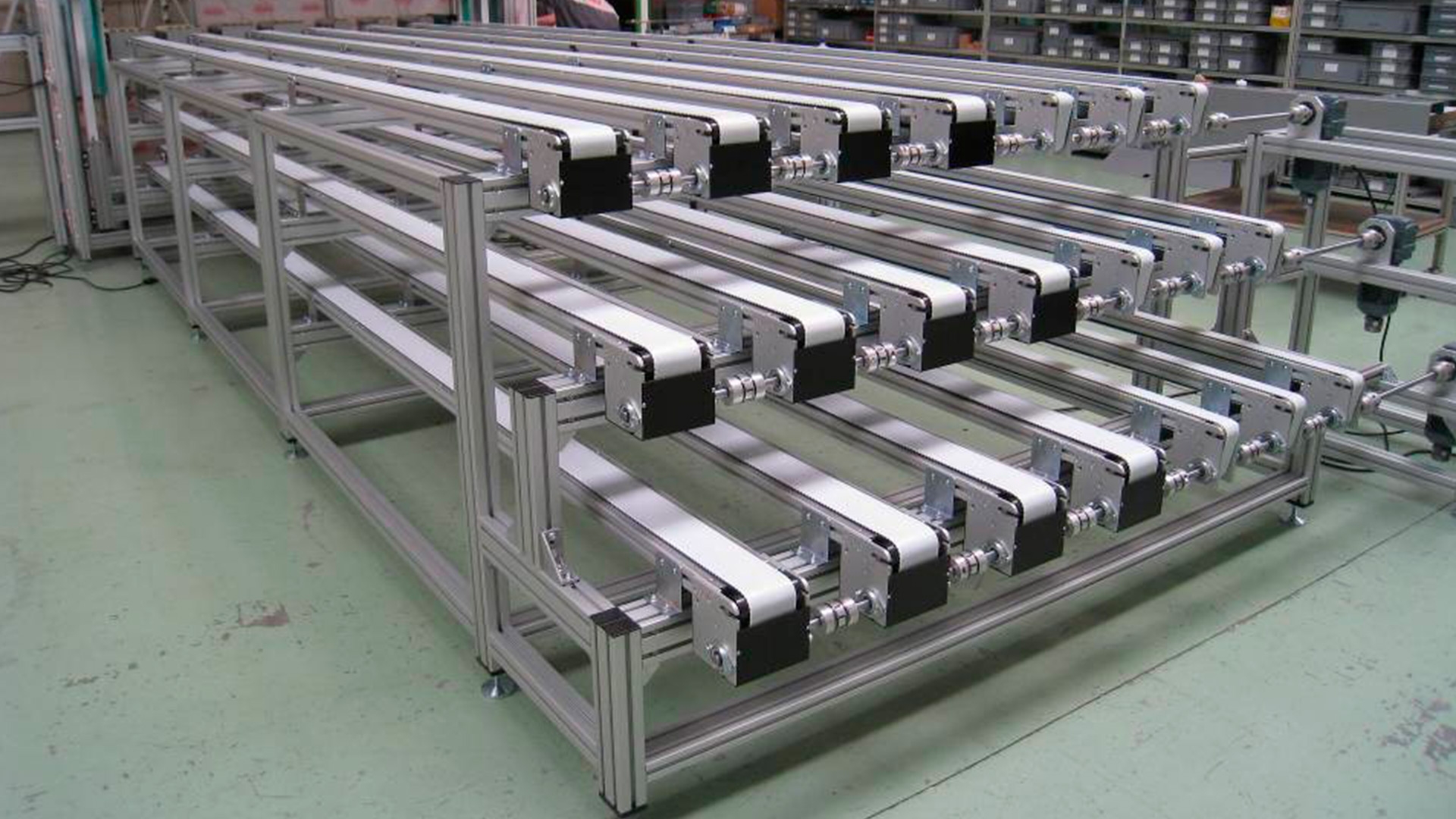 Timing belt conveyors