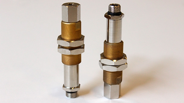 Spring levelers with internal spring and threaded connection